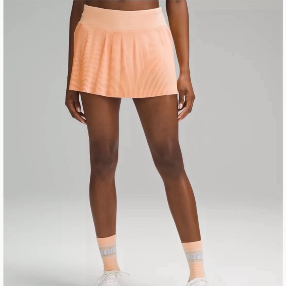 Lululemon Pleat to Street Skirt size 2 slight tear in back: see photos